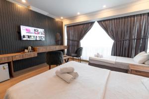 Postel nebo postele na pokoji v ubytování Highway 34 Hotel