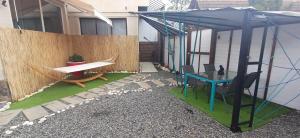a garden with a hammock and a table and chairs at Vila Zeus in Cristian +22 photos