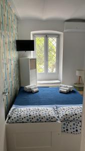 En eller flere senge i et værelse på Villetta Fioregreco + 63 billeder