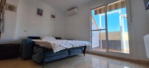 Postel nebo postele na pokoji v ubytování A & G Sabinillas