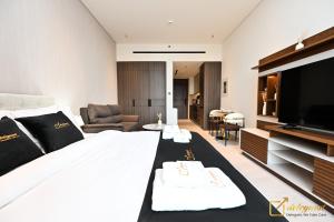 Телевизор и/или развлекательный центр в Modern Studio in Arjan by Deleguest