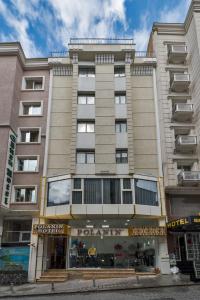 a building with a store in front of it at Polanin Hotel in Istanbul