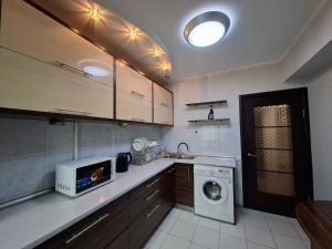 Kuchyň nebo kuchyňský kout v ubytování Apartment in street Kievskaya 49 + 3 fotografie