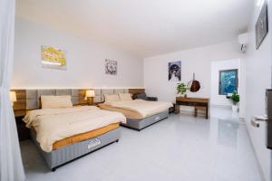 Katil atau katil-katil dalam bilik di Ha Giang Loop Discovery Hostel