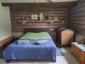 Ένα ή περισσότερα κρεβάτια σε δωμάτιο στο Kooti Ait