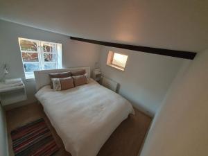 Postel nebo postele na pokoji v ubytování Cozy House