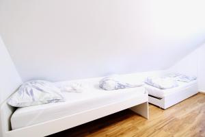 A bed or beds in a room at Ferienhaus Hadernigg