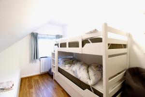 A bed or beds in a room at Ferienhaus Hadernigg