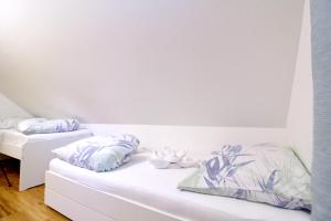 A bed or beds in a room at Ferienhaus Hadernigg