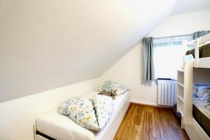 A bed or beds in a room at Ferienhaus Hadernigg