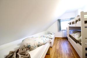 A bed or beds in a room at Ferienhaus Hadernigg