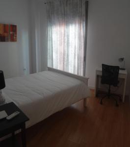 Málaga Apartamentos - Montaño, 18 객실 침대