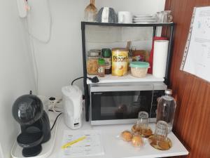Kuchyň nebo kuchyňský kout v ubytování Alexia Room