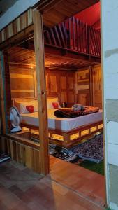 Postel nebo postele na pokoji v ubytování Duplex House Jibhi