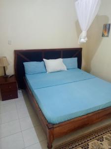 Casa Cacheu Homestay Guest House客房内的一张或多张床位