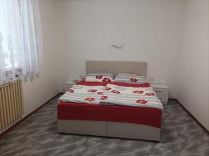 Postel nebo postele na pokoji v ubytování Vila Sobědraž