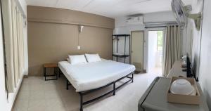 Postel nebo postele na pokoji v ubytování Phuviewplace Hotel - โรงแรมภูวิวเพลส