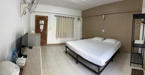Postel nebo postele na pokoji v ubytování Phuviewplace Hotel - โรงแรมภูวิวเพลส