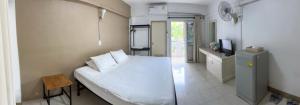 Postel nebo postele na pokoji v ubytování Phuviewplace Hotel - โรงแรมภูวิวเพลส