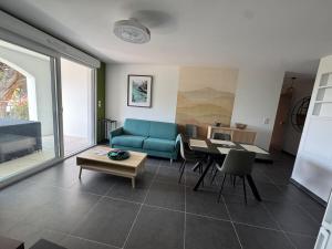 Et opholdsområde på Bel Appartement Tout Neuf