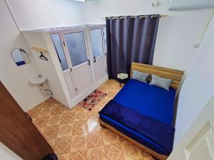 Postel nebo postele na pokoji v ubytování Tropical Edge