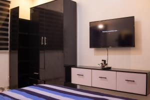 TV a/nebo společenská místnost v ubytování Budos Hauzing