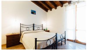 Agriturismo La Sorgente客房内的一张或多张床位