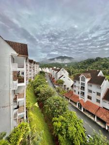 a view of a town with houses and a street at Minions In The Hills in Bentong +6 photos