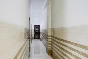 Fotografie z fotogalerie ubytování Hotel O YOUR RESIDENCY v destinaci Ghaziabád