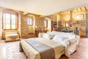 Ένα ή περισσότερα κρεβάτια σε δωμάτιο στο Chianti Essence Apartment