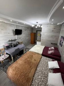 Una cama o camas en una habitación de OliverApartments