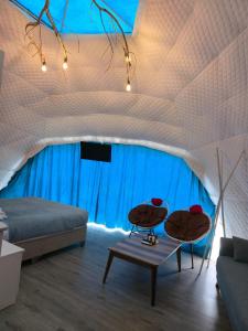 Posezení v ubytování Glamping Machakhela