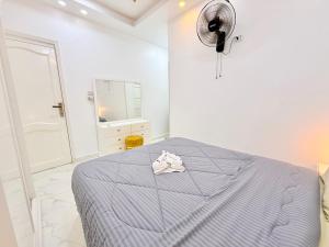 Postel nebo postele na pokoji v ubytování White Gorf Hotel