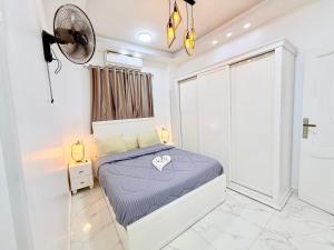 Postel nebo postele na pokoji v ubytování White Gorf Hotel