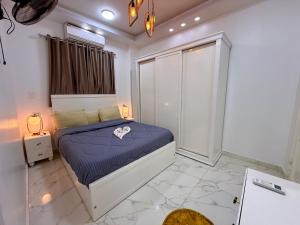 Postel nebo postele na pokoji v ubytování White Gorf Hotel