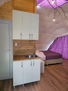 Voodi või voodid majutusasutuse Glamping Machakhela 2 toas