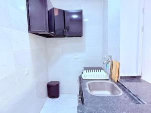 Kuchyň nebo kuchyňský kout v ubytování White Gorf Hotel