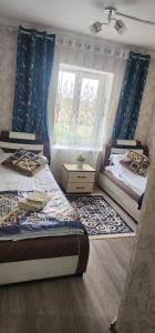 Postel nebo postele na pokoji v ubytování CBT1 Hotel