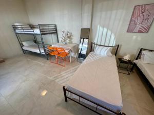 Ένα ή περισσότερα κρεβάτια σε δωμάτιο στο Seaside Apartments & Rooms Kampouri