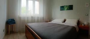 Postel nebo postele na pokoji v ubytování Rio Taglio