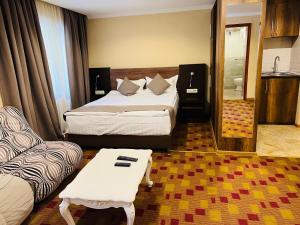 Voodi või voodid majutusasutuse Hotel Iveria toas