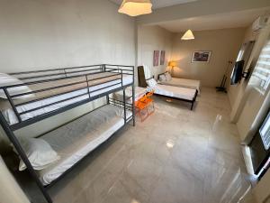 Ένα ή περισσότερα κρεβάτια σε δωμάτιο στο Seaside Apartments & Rooms Kampouri +37 φωτογραφίες