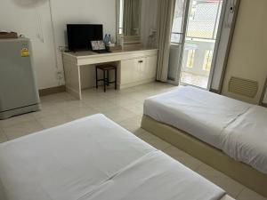Postel nebo postele na pokoji v ubytování Phuviewplace Hotel - โรงแรมภูวิวเพลส