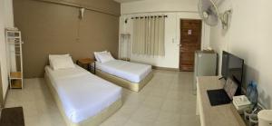 TV a/nebo společenská místnost v ubytování Phuviewplace Hotel - โรงแรมภูวิวเพลส