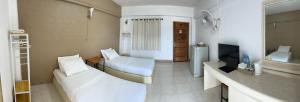 TV a/nebo společenská místnost v ubytování Phuviewplace Hotel - โรงแรมภูวิวเพลส + 33 fotografií