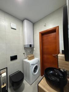 Kuchyň nebo kuchyňský kout v ubytování Apartment Holetić