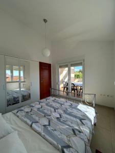 Postel nebo postele na pokoji v ubytování Apartment Holetić