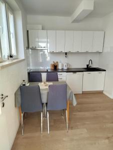 Kuchyň nebo kuchyňský kout v ubytování Apartment Bonaca