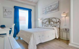 Voodi või voodid majutusasutuse Smart Suite & Apartments toas