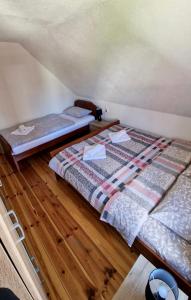 Postel nebo postele na pokoji v ubytování Sobe Baranin Zabljak